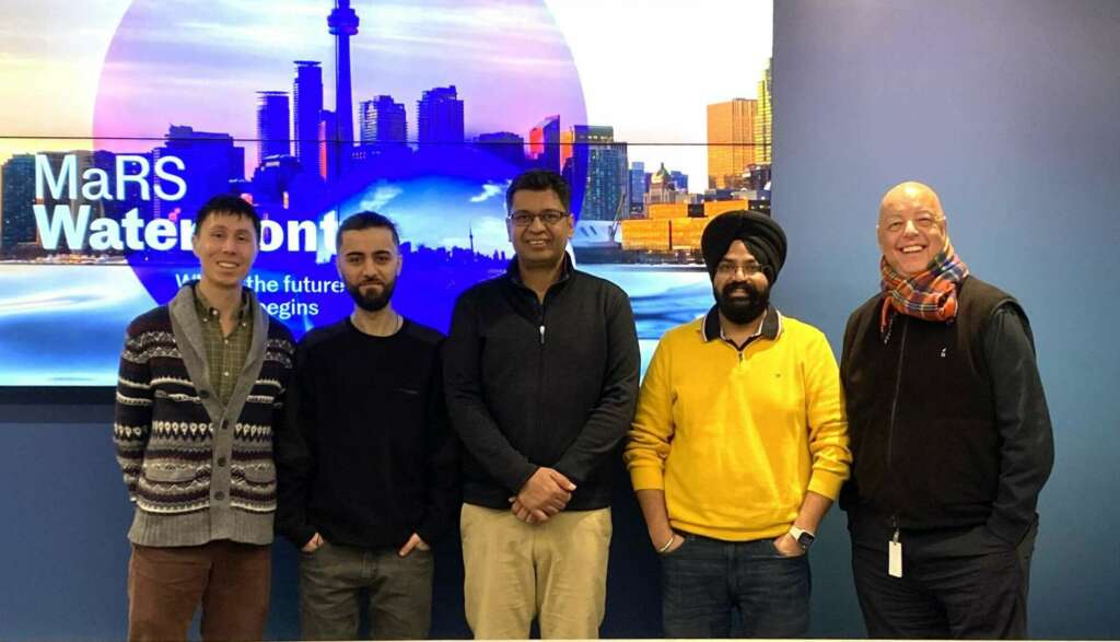 Toronto Global team smiling with XLSCOUT team at the MaRS Waterfront Innovation Centre.